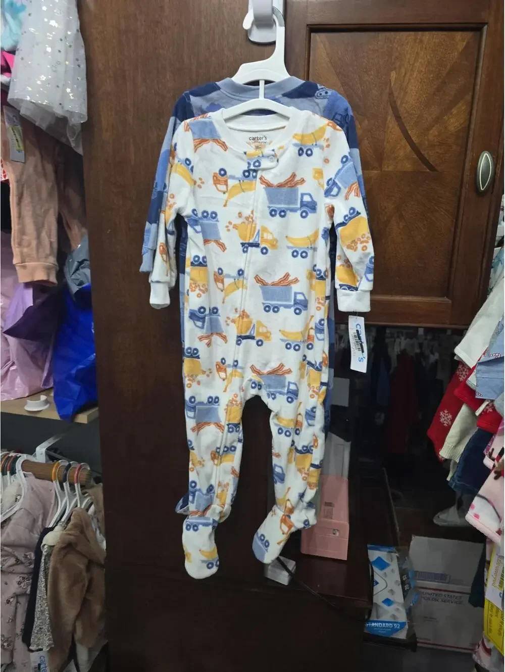 18m brand new 2 pack of fleece footed pajamas.Item 742
